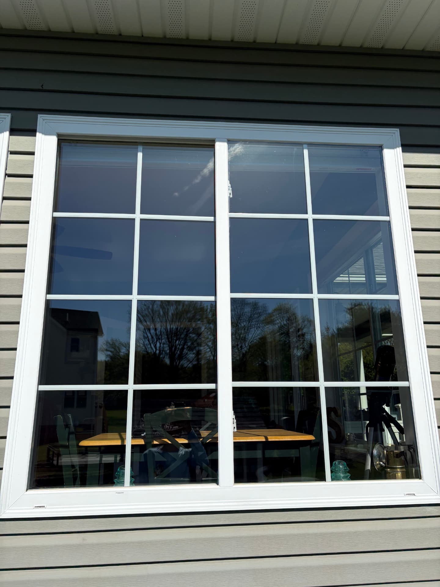 Spotless, streak-free home window with clean frame and sill